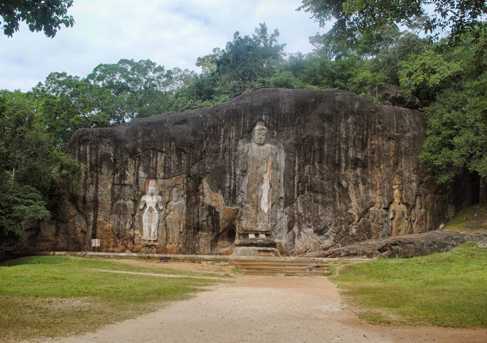 The seven rock-cut figures at Buduruwagala, the central standing Buddha nearly sixteen metres tall.