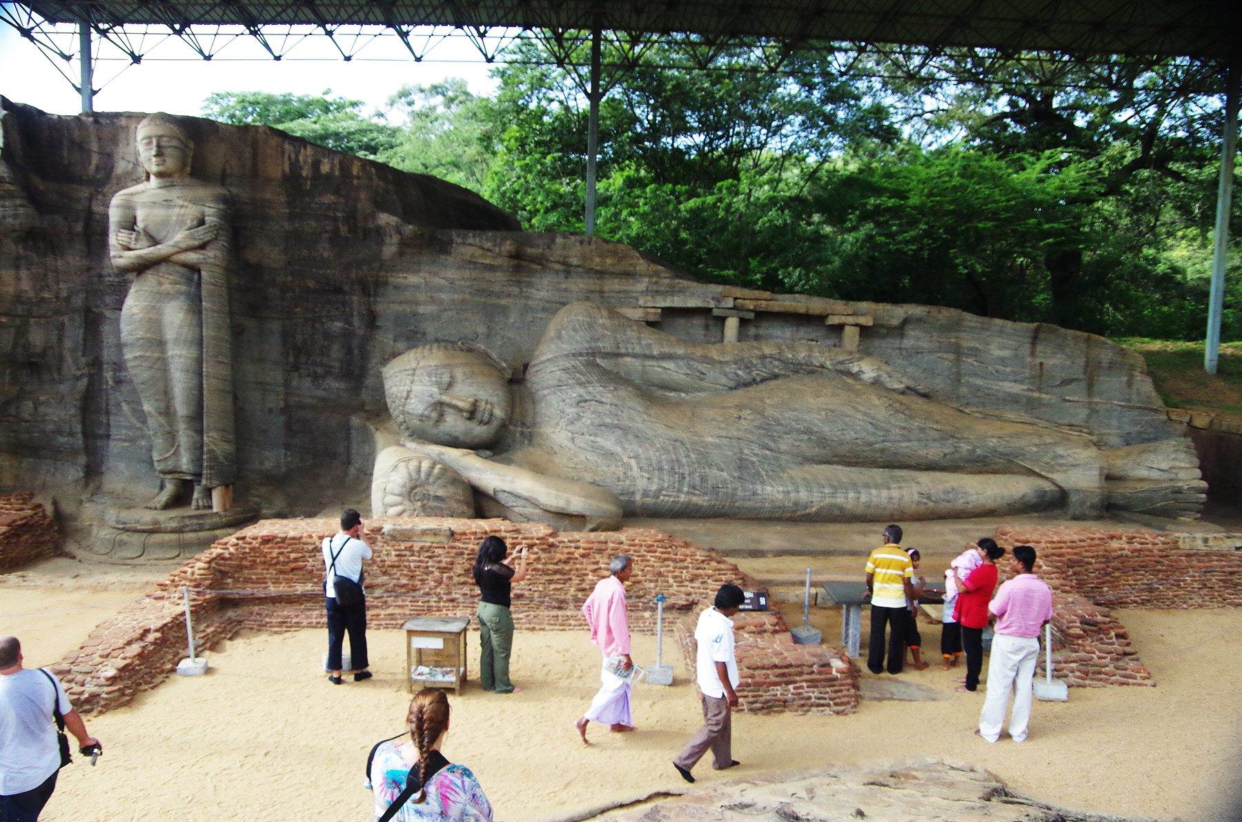 The reclining Buddha at Gal Vihāra, Polonnaruwa, carved from a continuous face of granite.