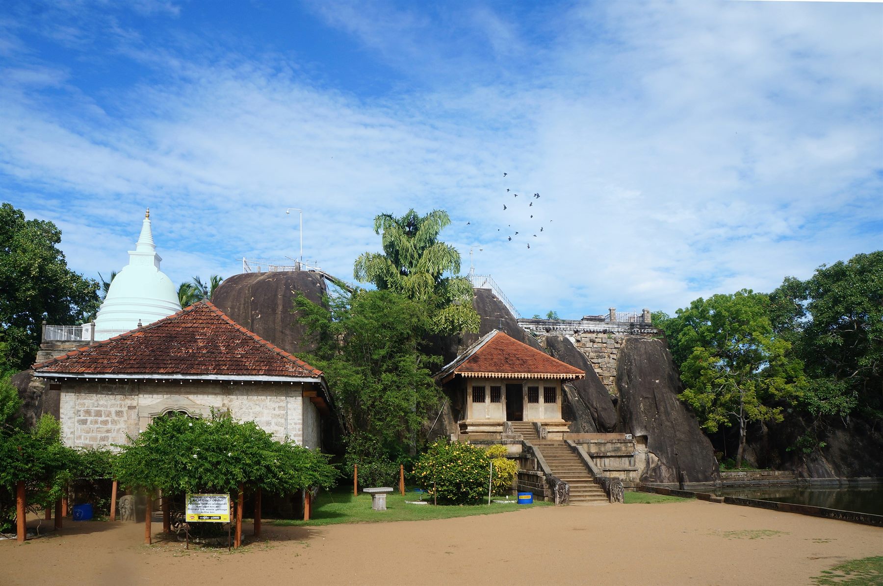 The Isurumuniya rock temple at Anurādhapura, cut into the rock beside a bathing tank.